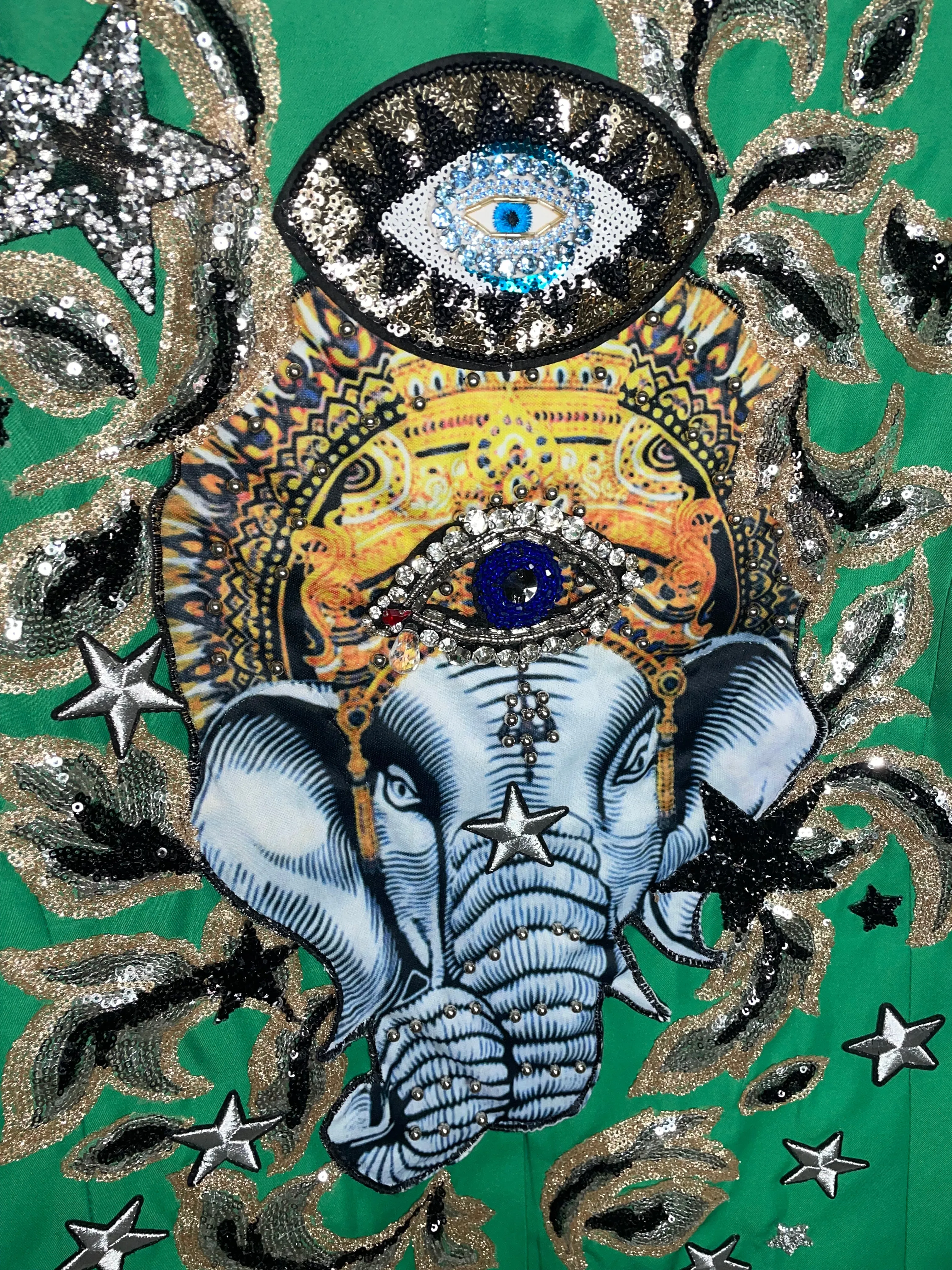 Ganesh in Green Blazer