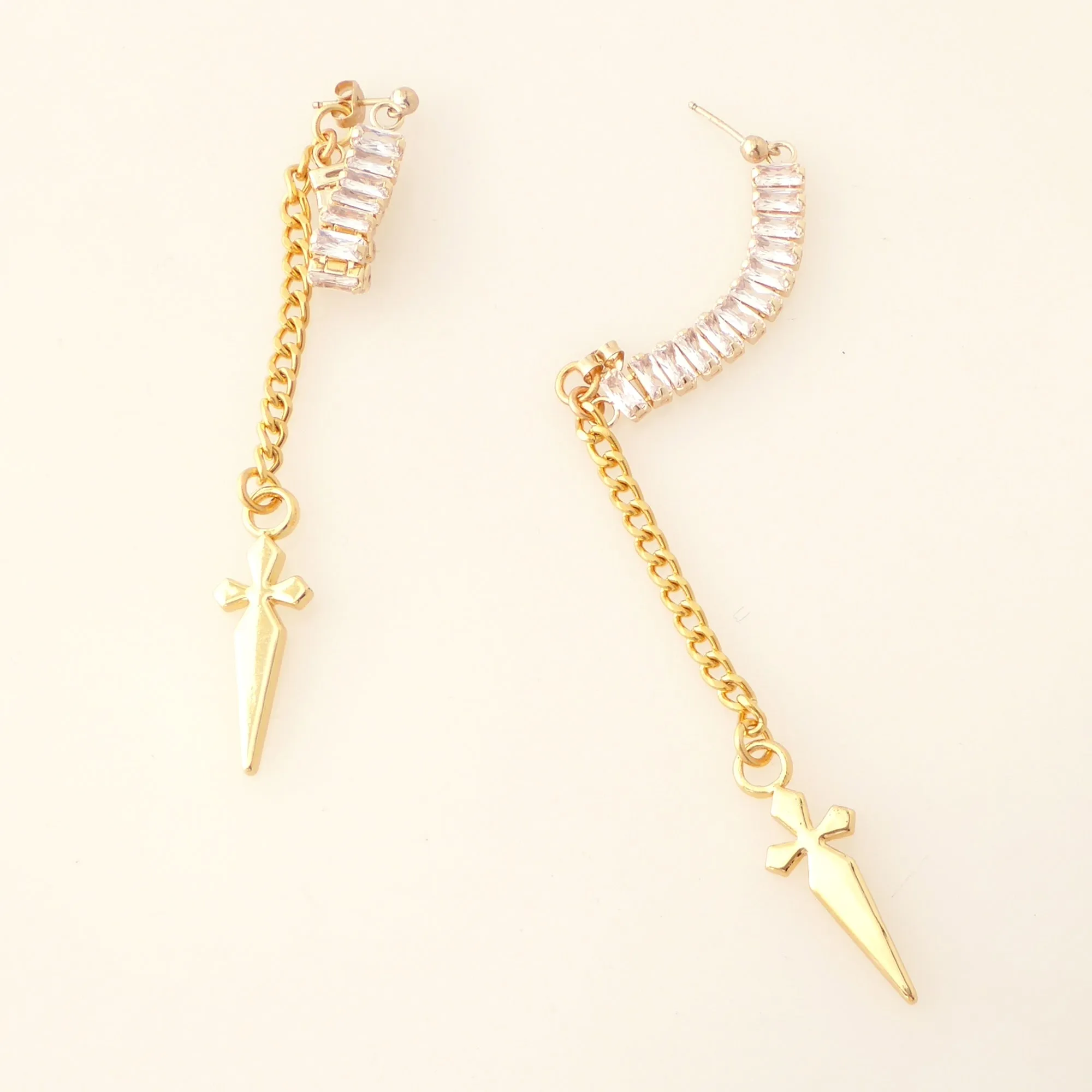 Gold rhinestone baguette dagger earrings