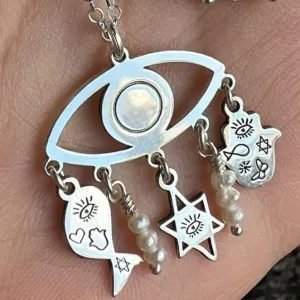 Sterling Silver Charms of Israel hanging on the protection symbol eye. Fish, Star of David, Hamsa.